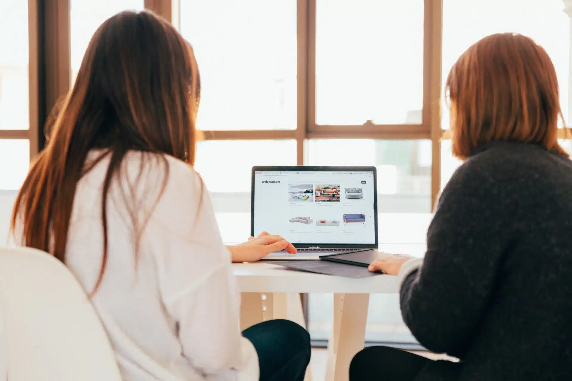 PPC campaign two women searching stock photo